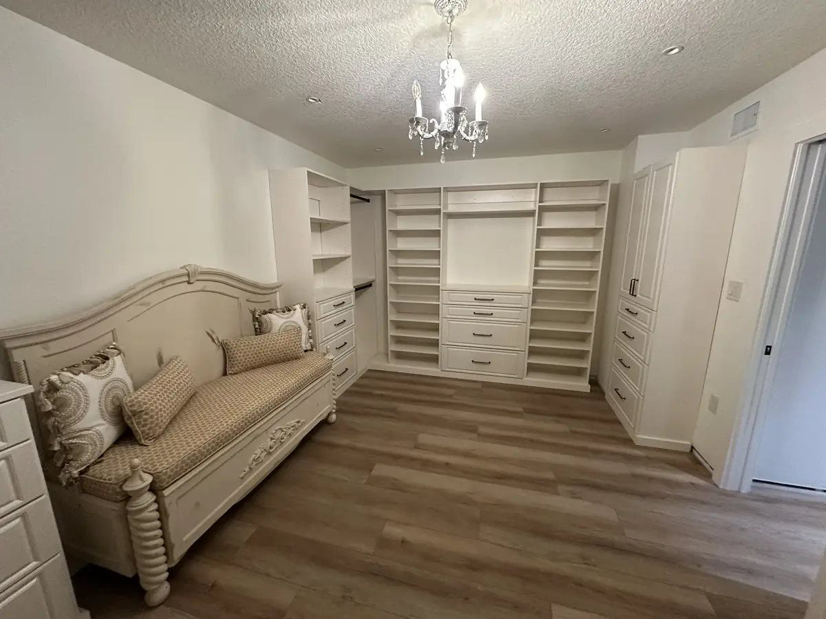 Custom dressing room with built-in cabinetry