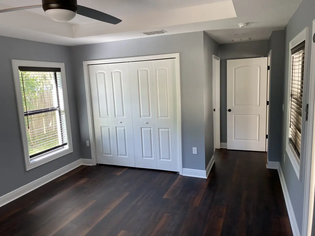Home interior after new doors, trim, flooring, and paint