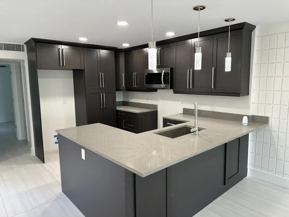 Kitchen remodel with dark-stained cabinetry