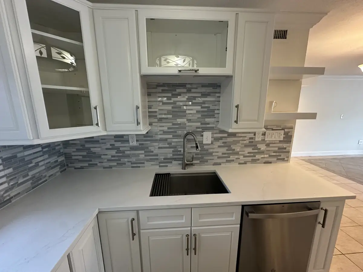 Kitchen remodel with a mosaic tile backsplash