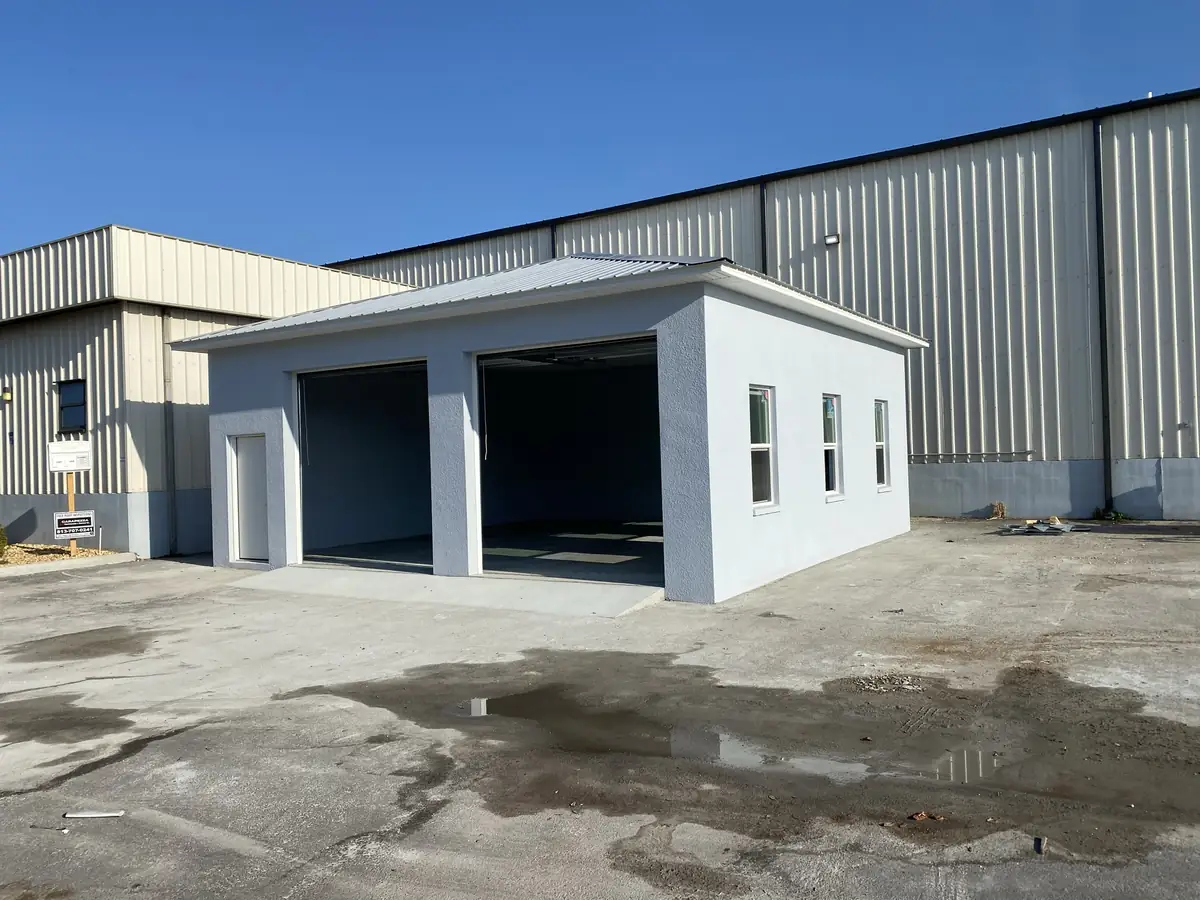 New office structure built against an existing metal building